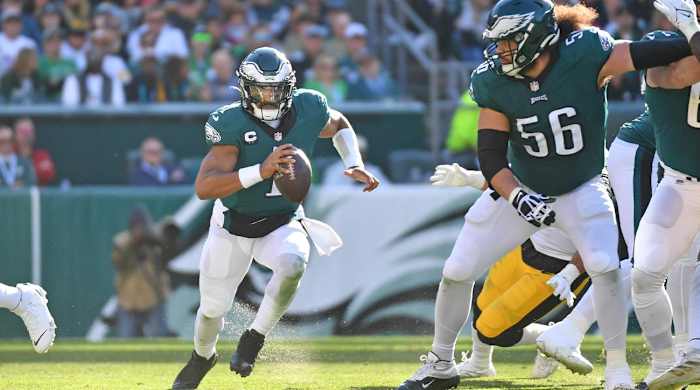 Oct 30, 2022; Philadelphia, Pennsylvania, USA; Philadelphia Eagles quarterback Jalen Hurts (1) runs with the football against the Pittsburgh Steelers during the third quarter at Lincoln Financial Field.